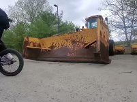 Riding past a bulldozer