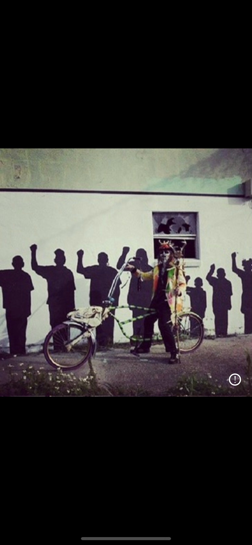 Raised fists mural and custom bike